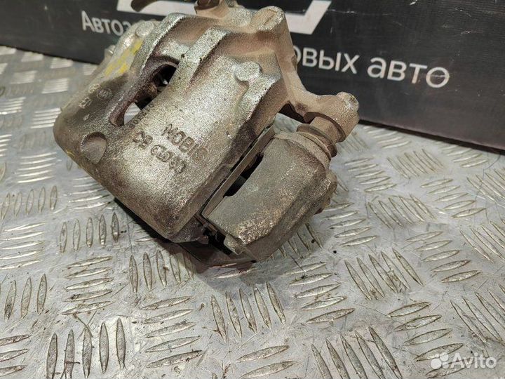 Суппорт тормозной передний левый Kia Ceed ED