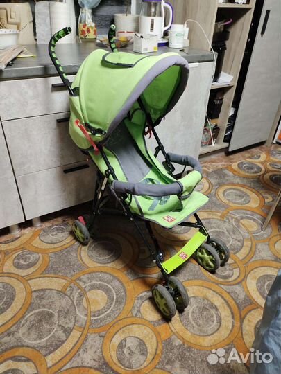 Прогулочная коляска трость