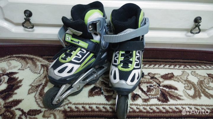 Роликовые коньки