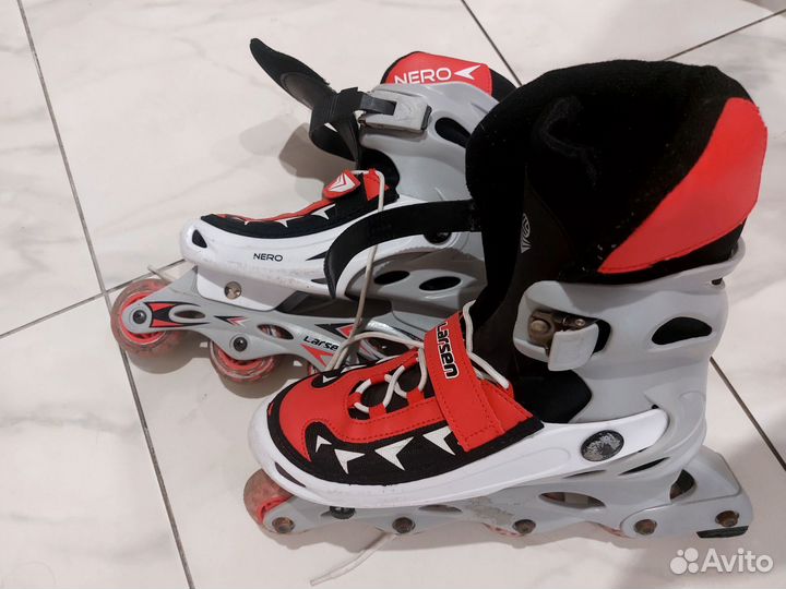 Роликовые коньки