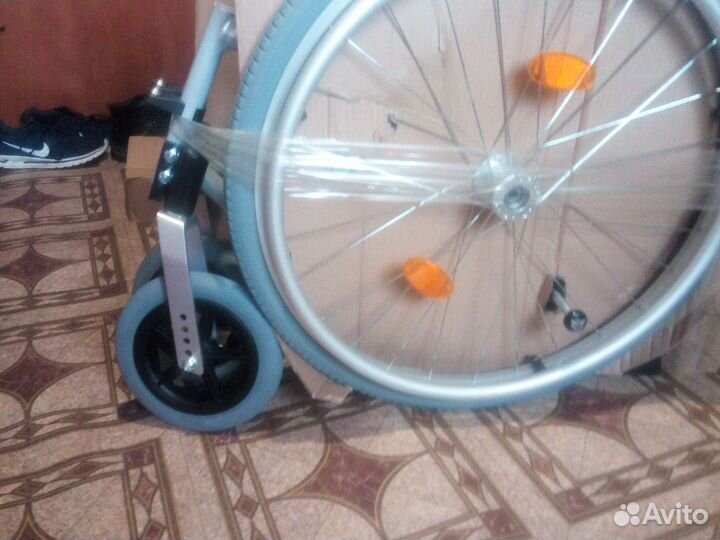 Инвалидная коляска