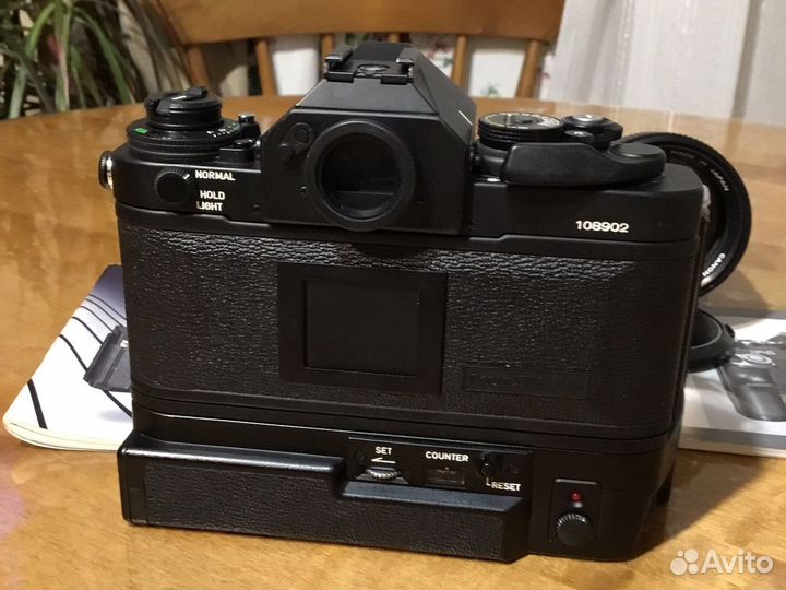 Canon new F-1 + FD 50mm/1,4 + FD 135mm/2,5s.c