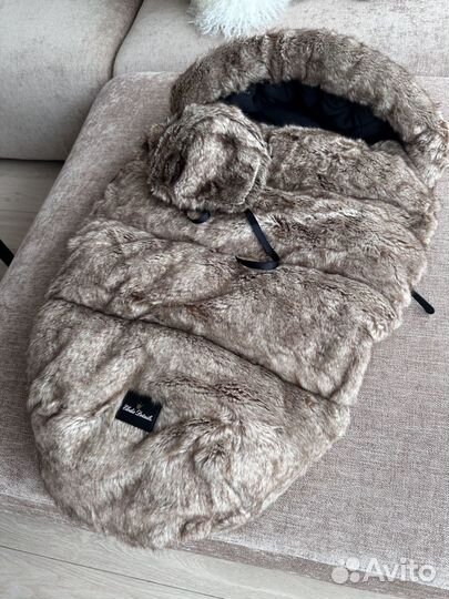 Меховой конверт в коляску