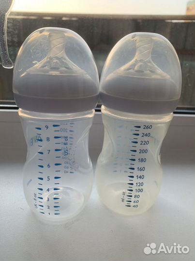 Молокоотсос ручной avent + две бутылочки avent 260