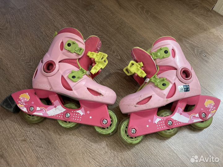 Роликовые коньки