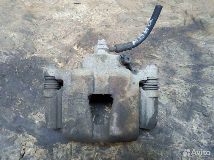 Суппорт передний левый Chevrolet Lanos 1.2