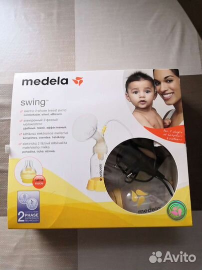 Молокоотсос medela электрический