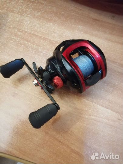 Катушка рыболовная мультипликаторная