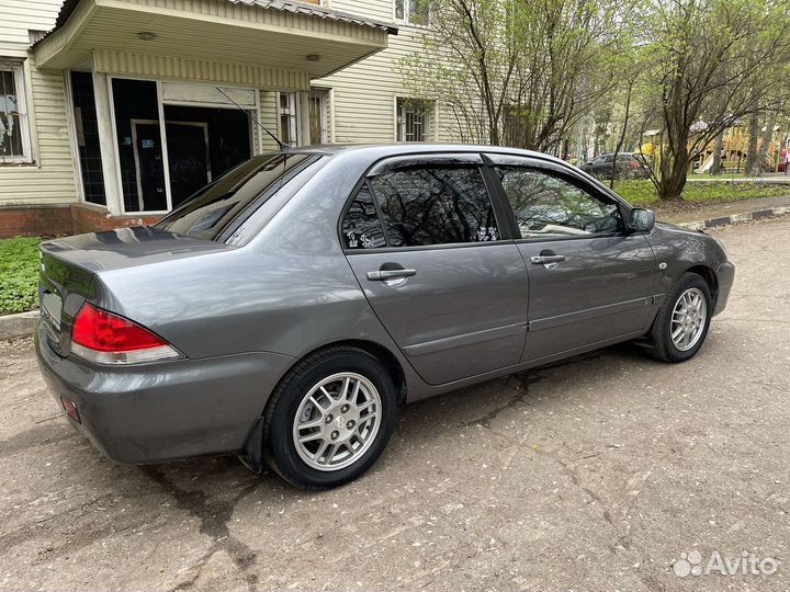 Mitsubishi Lancer 1.6 МТ, 2006, 219 000 км