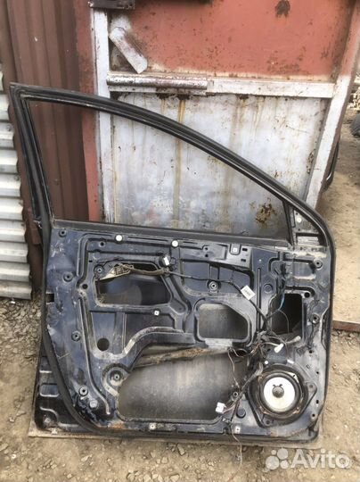 Дверь передняя левая Geely Emgrand EC7