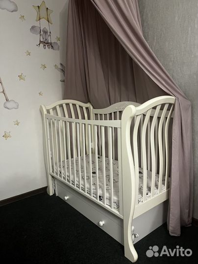 Детская кроватка с маятником гандылян