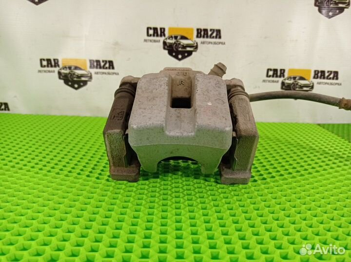 Суппорт тормозной задний правый R Toyota Camry