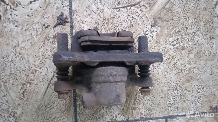 Суппорт задний левый mitsubishi lancer 9