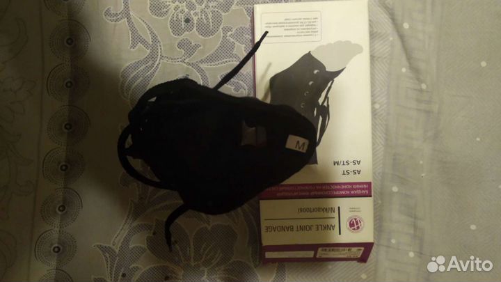 Фиксирующий бандаж для ноги