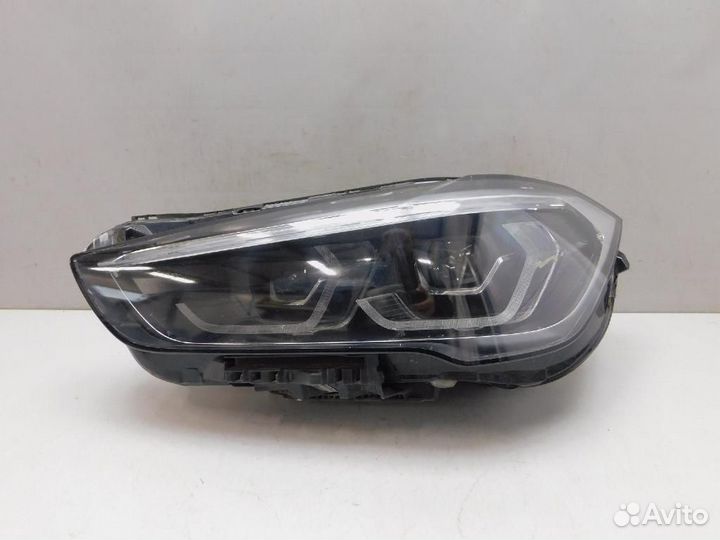 Фара левая BMW X1