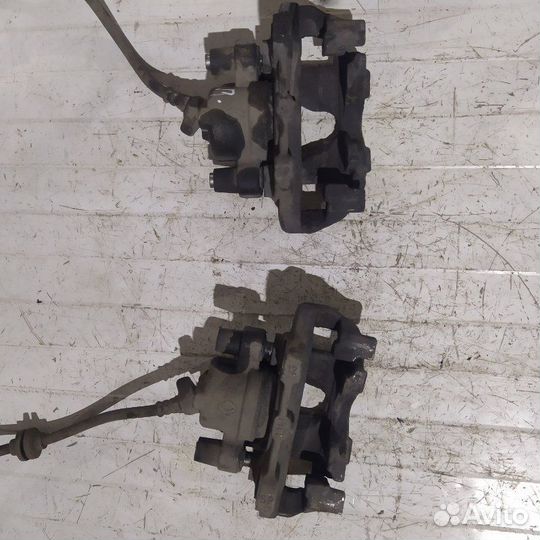 Суппорт тормозной передний Renault Logan 2 седан