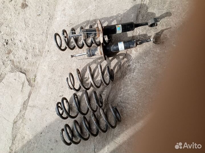 Стойки с пружинами