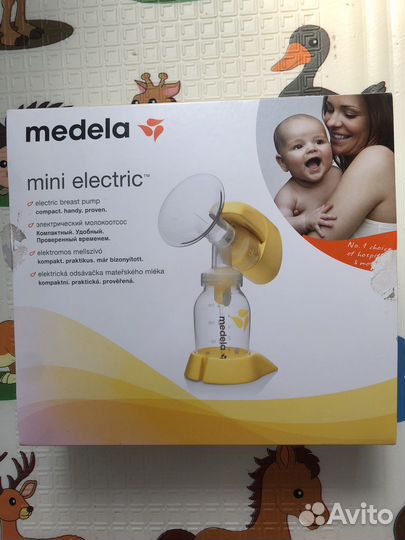 Молокоотсос medela электрический