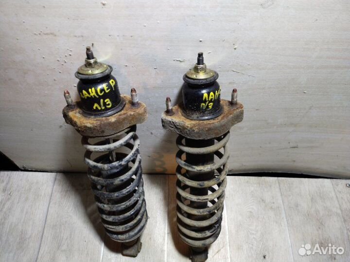 Стойка подвески задняя Mitsubishi Lancer 9