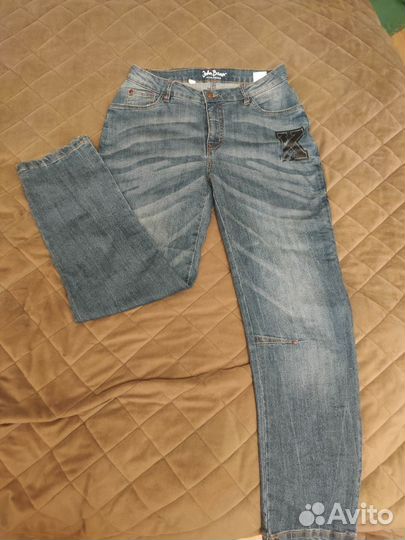 Джинсы новые