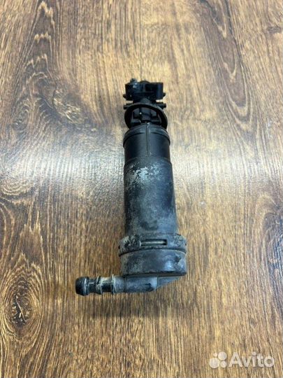 Форсунка омывателя фар передняя Nissan Note