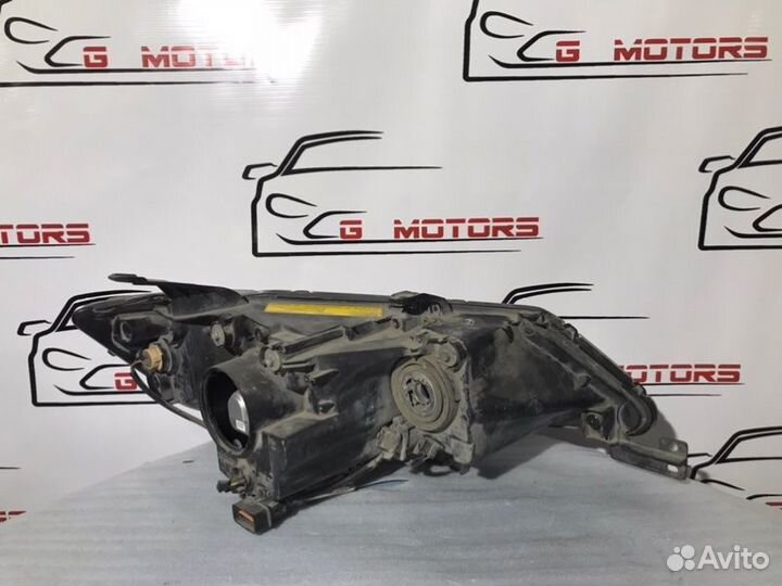 Фара ксеноновая левая Mitsubishi Outlander XL