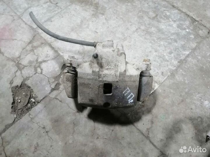 Суппорт тормозной правый Mitsubishi Lancer 9