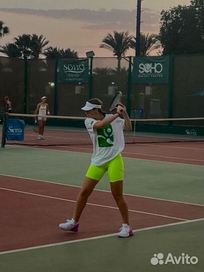 Тренер по большому теннису