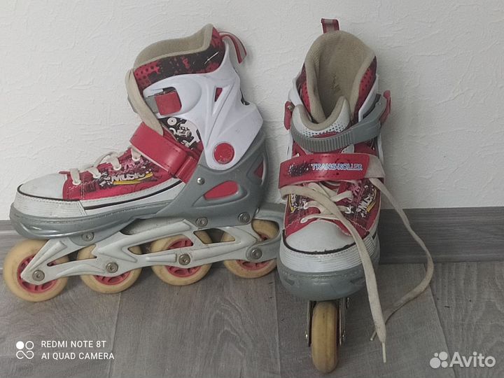 Роликовые коньки