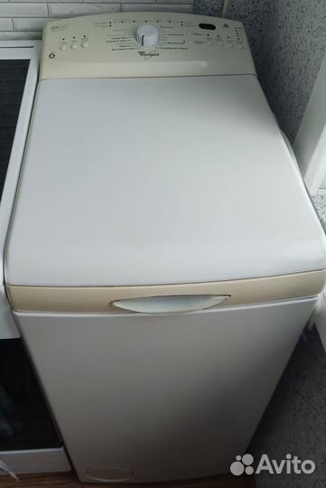 Стиральная машина с вертикальной загрузкой