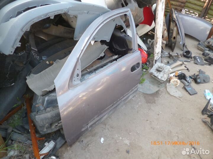 Дверь передняя левая Ниссан Блюберд Силфи