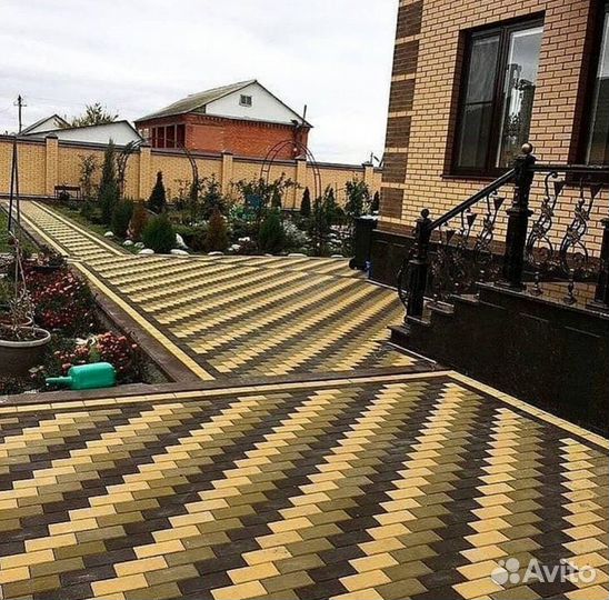 Укладка тротуарной плитки брусчатки