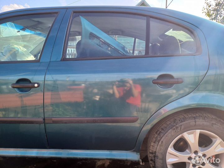 Дверь задняя левая skoda octavia a4