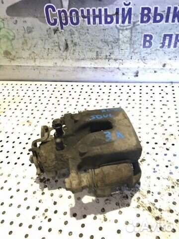 Суппорт тормозной задний левый Kia Soul