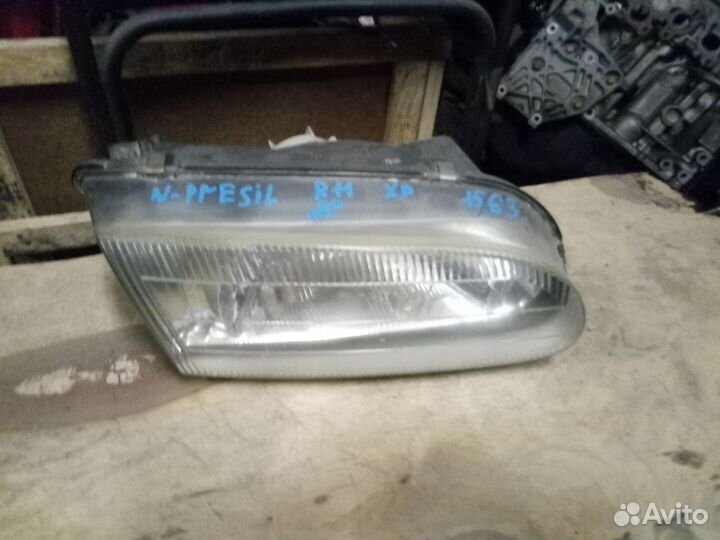 Фара правая nissan presea r11 (1563)