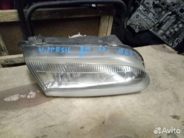 Фара правая nissan presea r11 (1563)