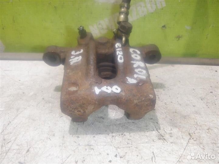 Суппорт задний правый Тойота Королла Е120