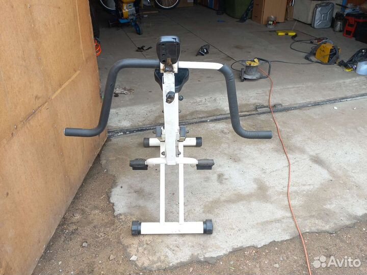 Гребной тренажер