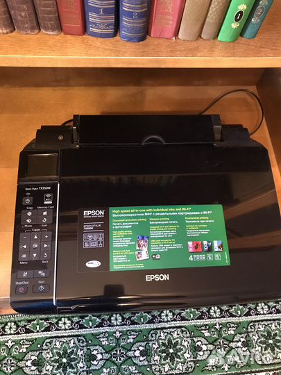 Фотопринтер мфу струйное Epson Stylus TX550W
