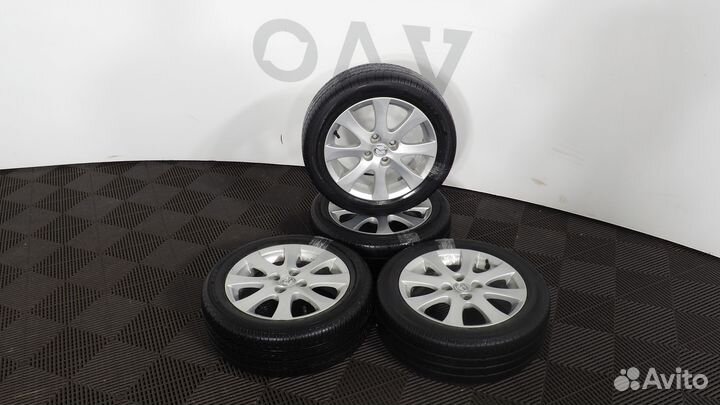 Комплект колёс Mazda оригинал Toyo R27 185/55 R15