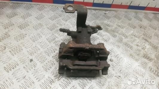 Суппорт тормозной задний правый toyota avensis T27