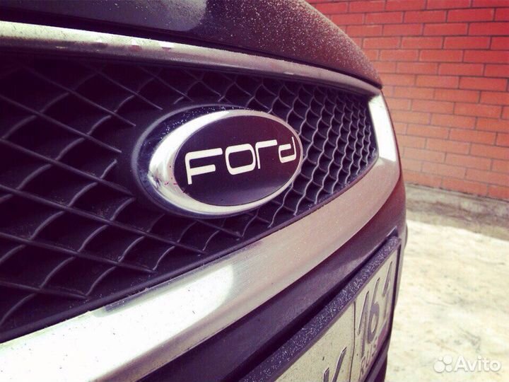 Наклейки на эмблемы Ford Focus