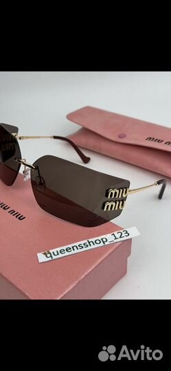 Солнцезащитные очки Miu Miu