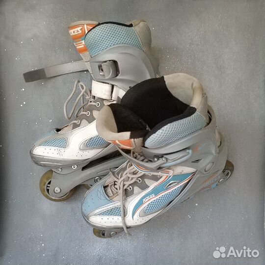 Роликовые коньки