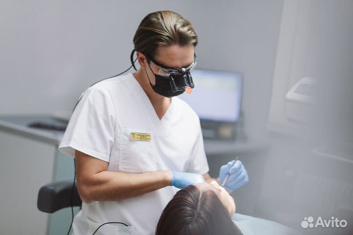 Врач стоматолог
