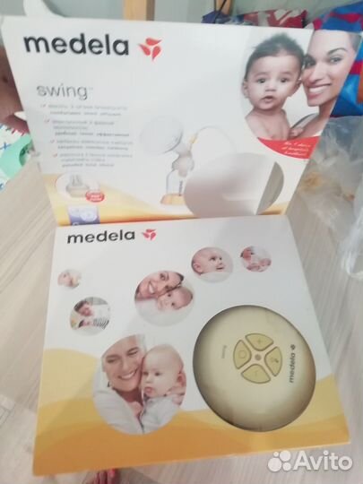 Молокоотсос medela swing электрический