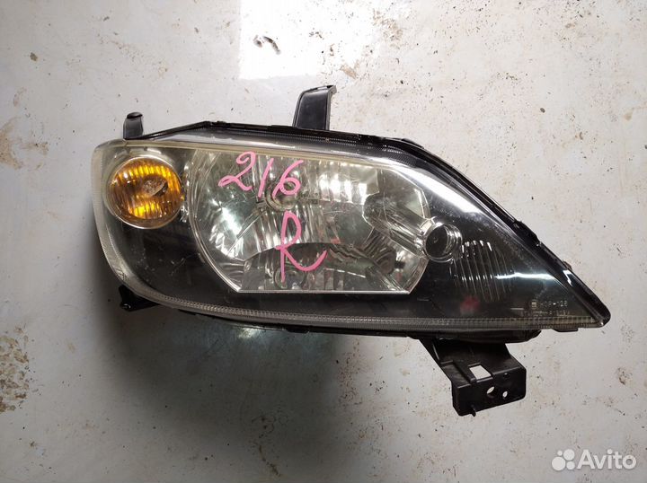 Фара Mazda Demio 2002-2005