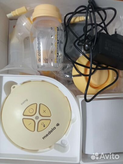 Молокоотсос medela электрический