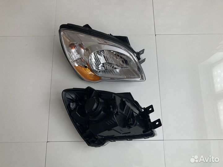 Фара (1шт) KIA Sportage 2