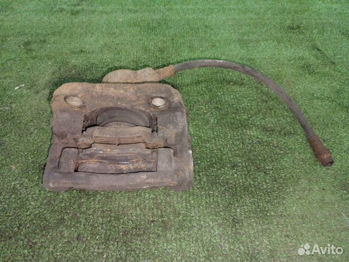 Суппорт тормозной передний правый Renault Logan 1